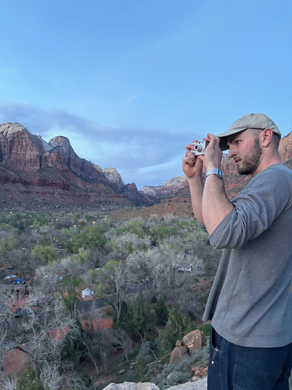 Holding the Canon PowerShot SD1000